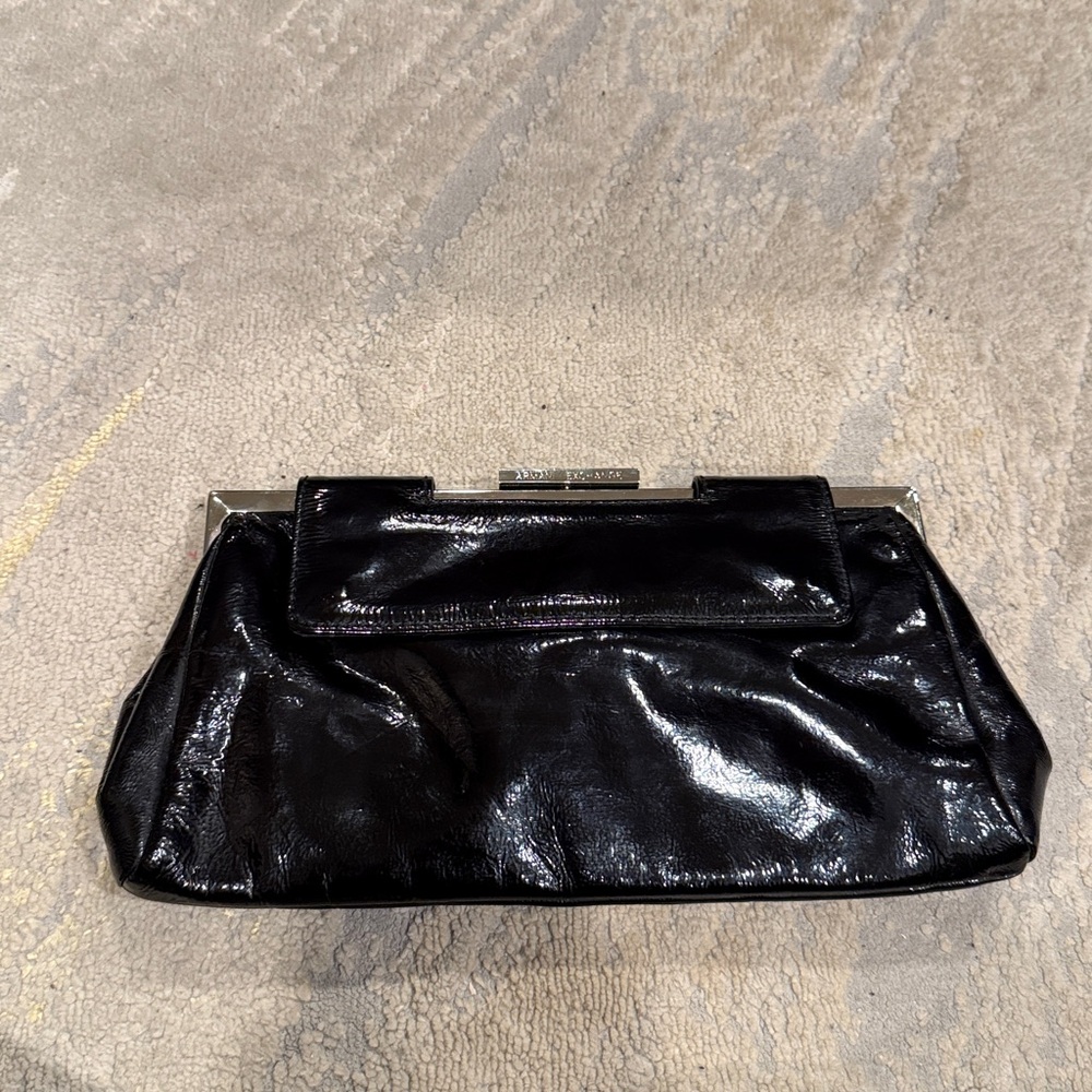 Armani exchange wristlet bag black and silver nice closure inside coin pocket‎